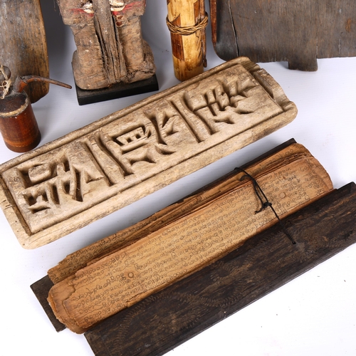 1046 - A group of African and Islamic wood artefacts, including 2 text school boards, length 46cm