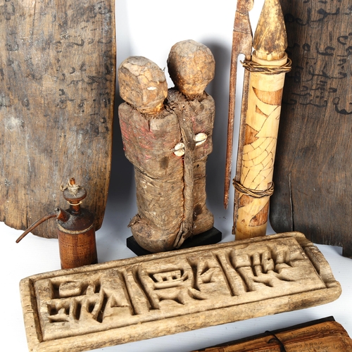 1046 - A group of African and Islamic wood artefacts, including 2 text school boards, length 46cm