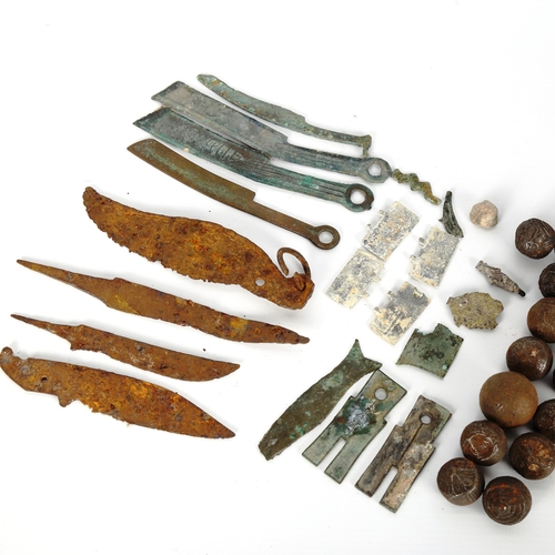 1047 - ANTIQUITIES - a collection of early Chinese knife money, and a collection of early bullet money