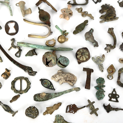 1049 - ANTIQUITIES - a collection of bronze artefacts