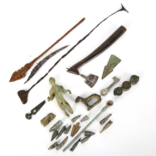 1052 - ANTIQUITIES - a group of metal artifacts, bronze figure etc