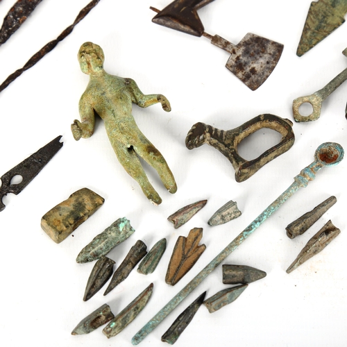 1052 - ANTIQUITIES - a group of metal artifacts, bronze figure etc