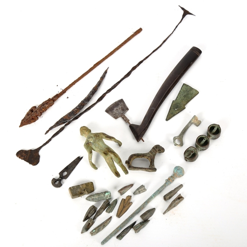 1052 - ANTIQUITIES - a group of metal artifacts, bronze figure etc