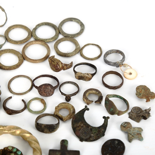 1053 - ANTIQUITIES - a collection of bronze artefacts, rings, jewellery etc