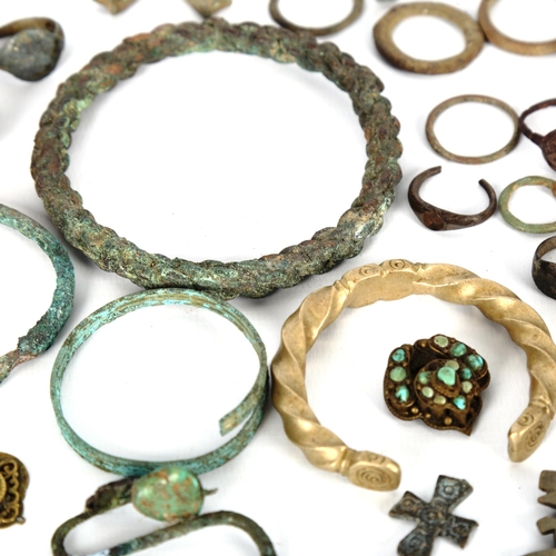 1053 - ANTIQUITIES - a collection of bronze artefacts, rings, jewellery etc