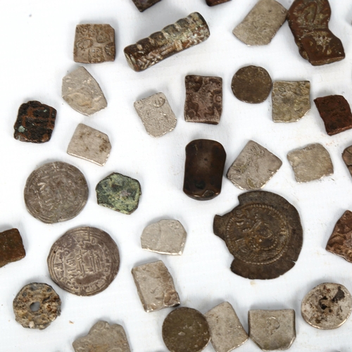 1066 - A group of early silver coins, a bronze cylinder seal etc