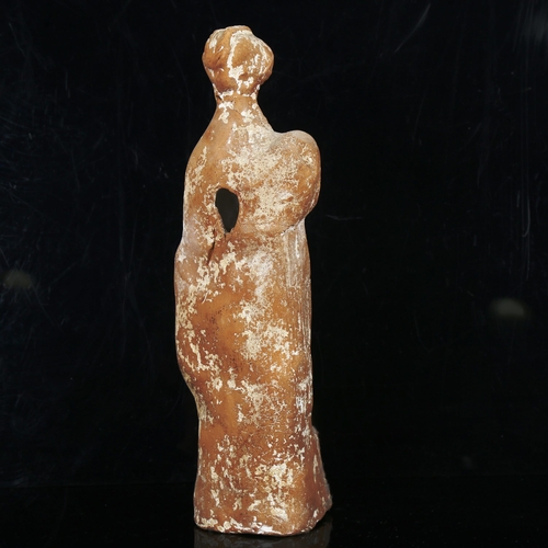 1070 - A Greek terracotta standing figure of a goddess, height 31cm