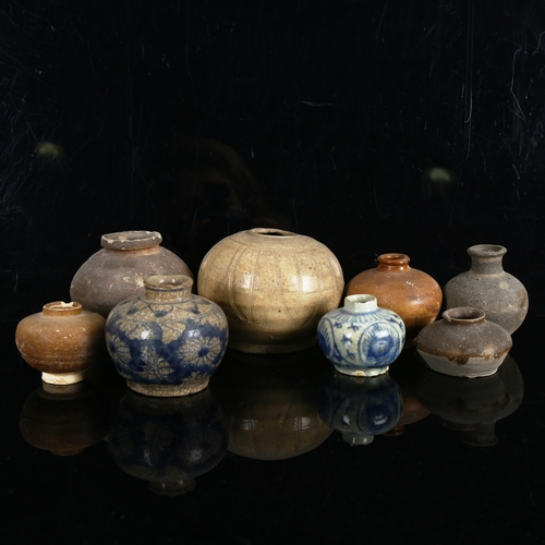 1072 - A group of Oriental ceramic pots and vases, largest height 9cm (8)