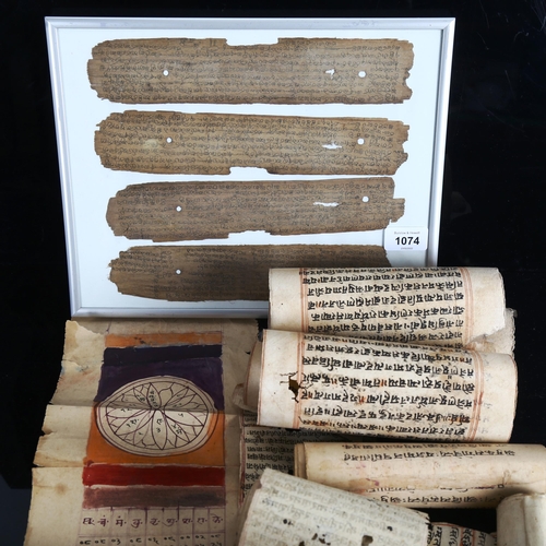 1074 - Indian calligraphy scrolls, and a framed group of calligraphy panels