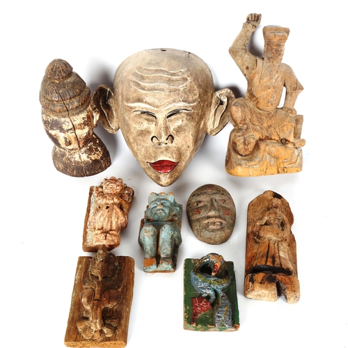 1080 - A group of Indian and Oriental wood carvings and masks (9)