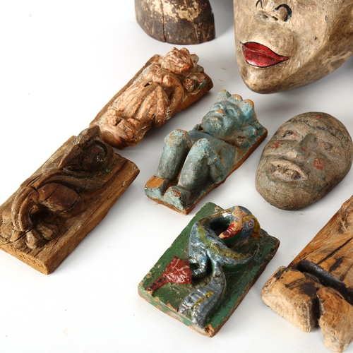 1080 - A group of Indian and Oriental wood carvings and masks (9)