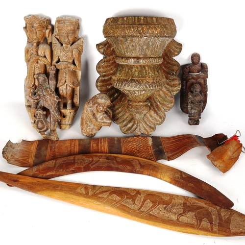 1094 - A group of Indian and Oriental wood carvings, including a carved wood wall bracket, length 31cm ((7)