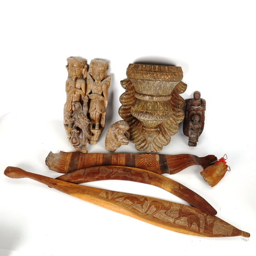 1094 - A group of Indian and Oriental wood carvings, including a carved wood wall bracket, length 31cm ((7)