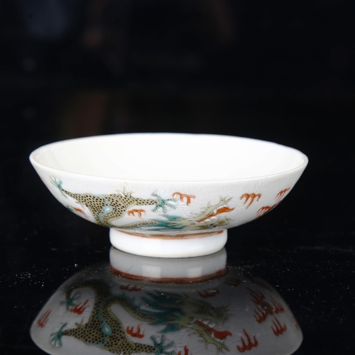 1103 - A Chinese white glaze porcelain bowl, with painted enamel dragons and pearls, 4 character mark, diam... 