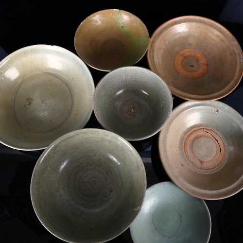 1106 - A group of Chinese celadon glaze porcelain bowls, largest diameter 23cm (7)