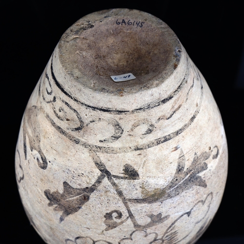 1107 - A Chinese terracotta urn, with painted decoration and neck ring handles, height 30cm, and an Egyptia... 