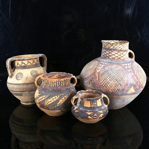 1108 - 4 early Greek terracotta pots with painted decoration, largest height 22cm