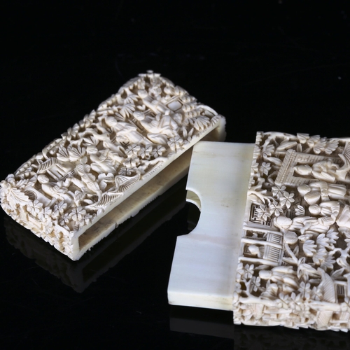 1126 - A Chinese Canton ivory card case, late 19th/early 20th century, finely detailed relief carved river ... 