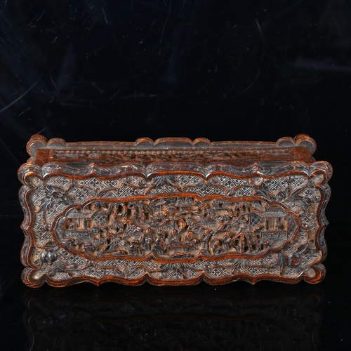 1128 - A 19th century Chinese wooden box of rectangular form, finely detailed allover relief carved panels,... 