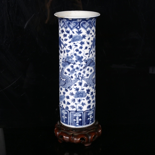 1130 - A Chinese porcelain sleeve vase, hand painted dragon design, 4 character mark, height 26cm, rim dime... 