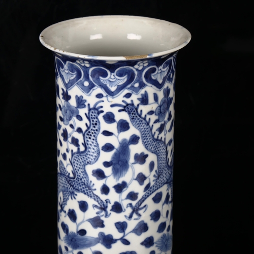 1130 - A Chinese porcelain sleeve vase, hand painted dragon design, 4 character mark, height 26cm, rim dime... 