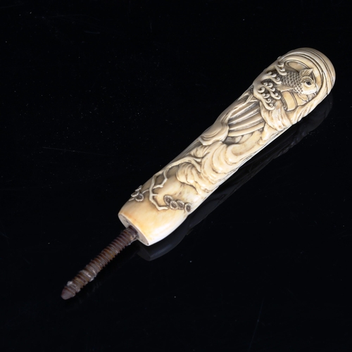 1138 - A Japanese relief carved ivory parasol handle, with carp and wave designs, length excluding screw fi... 