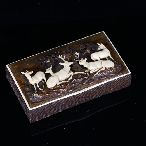 1143 - A 19th century Bavarian staghorn snuffbox, relief carved lid depicting deer in woodland, 10cm x 5.5c... 