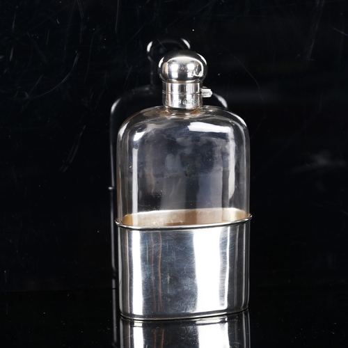 1145 - An Edwardian silver and glass spirit flask with removeable cup base, by Mappin & Webb, hallmarks Lon... 