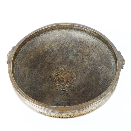 1149 - An exceptionally large Indian bronze Urli temple cooking cauldron, possibly 18th/19th century, decor... 