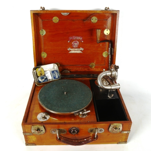 1154 - The Grippa portable gramophone circa 1920, original brass-bound mahogany case and leather carrying h... 