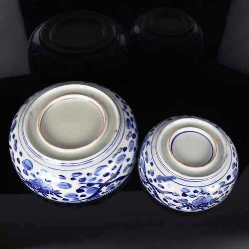 1161 - A graduated pair of Chinese blue and white porcelain bowls, with Ho Ho bird designs, diameter 25cm a... 