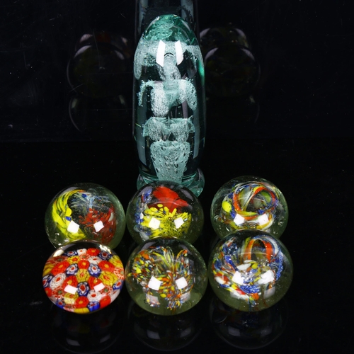 1178 - A green glass dump weight, height 15cm, and 6 other glass paperweights (7)