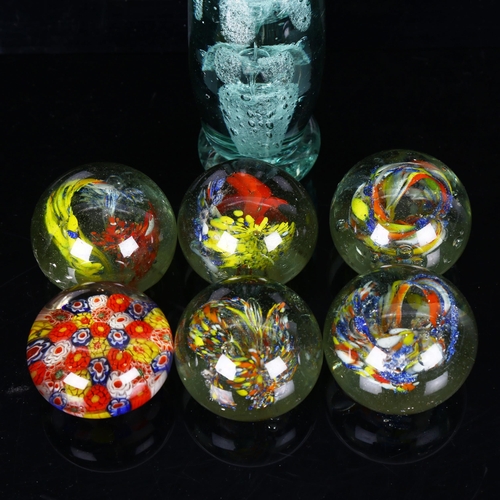 1178 - A green glass dump weight, height 15cm, and 6 other glass paperweights (7)