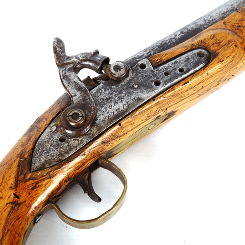 1190 - A 19th century percussion pistol, by John Spittle, with brass trigger guard and butt length 39cm