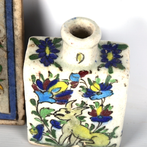 1201 - An Islamic faience glazed pottery tile, with painted decoration, 20cn x 20cm, and a similar painted ... 