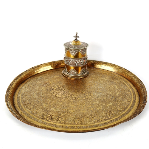 1202 - A Middle Eastern engraved brass oval tray, width 48cm, and a 19th century cylindrical pot and cover,... 