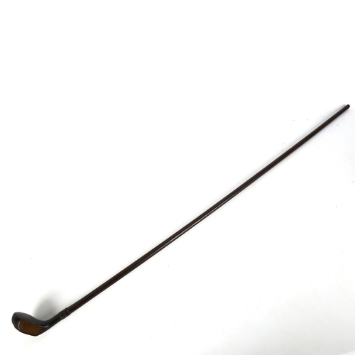 1219 - A Victorian golfing Sunday walking stick with brass-mounted head