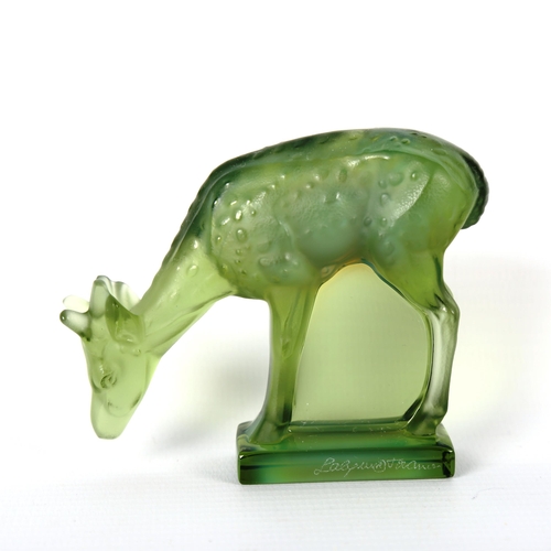 1227 - LALIQUE - a green glass dear, engraved signature, height 6.5cm