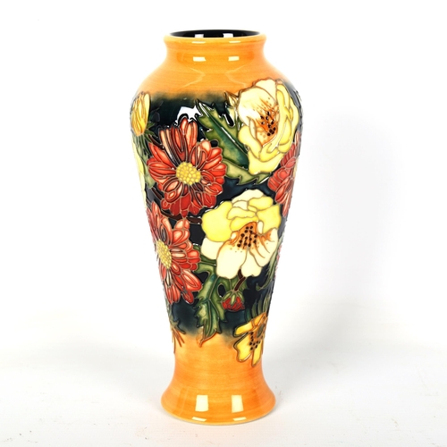 1233 - MOORCROFT POTTERY - a summer flowers design vase, by E Bossons 1997, height 21cm