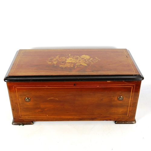 1253 - A 19th century Swiss rosewood and marquetry inlaid musical box playing 8 airs, on a 33cm cylinder an... 