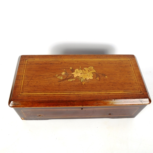 1254 - A 19th century Swiss rosewood and marquetry inlaid musical box, playing on a 20.5cm cylinder