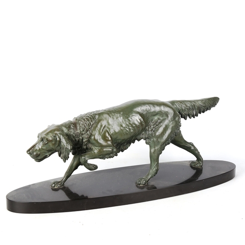 1260 - An Art Deco green patinated spelter Pointer dog, on oval black marble plinth, unsigned, circa 1920s,... 