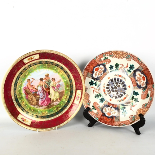 1271 - A Chinese Imari pattern charger with painted and gilded design, diameter 31cm, and a Vienna porcelai... 