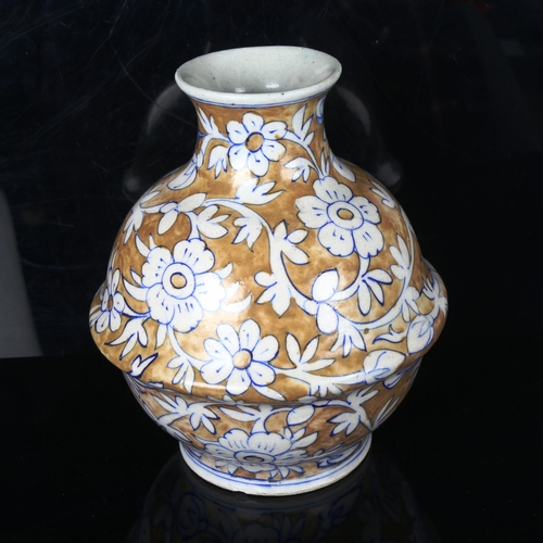 1274 - An Indian blue and brown glaze pottery vase, hand painted decoration, height 26cm