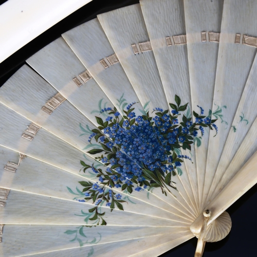 1289 - A French ivory fan with painted floral spray, length 19cm, and an ivory page turner, length 35cm (2)