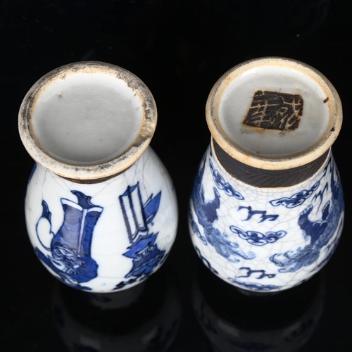 1291 - A pair of Chinese blue and white crackle glaze vases, height 16.5cm