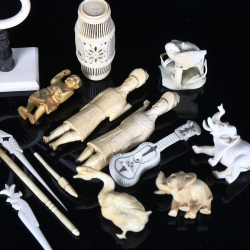 1292 - A collection of ivory and bone carvings