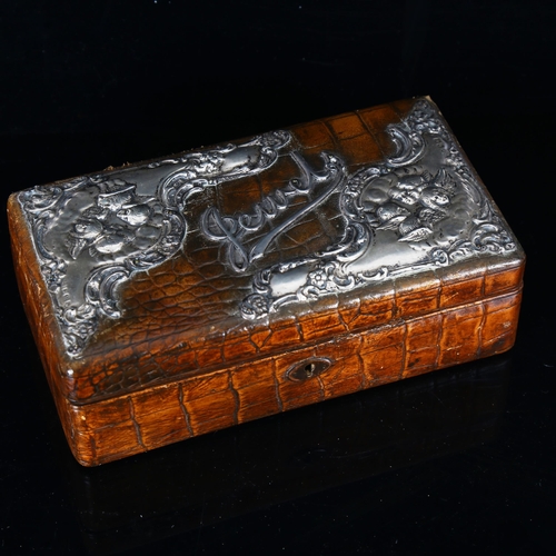 1293 - An Edwardian silver-mounted crocodile skin jewel box, hallmarks Birmingham 1905, length 19cm