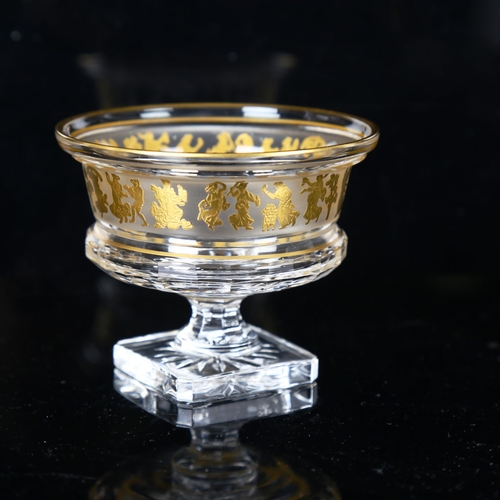 1296 - Val St Lambert, a small cut-crystal bowl on square foot, with gold oroplastic Danse De Flore frieze,... 