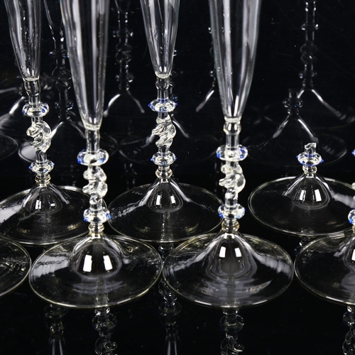 1297 - A set of 8 Venetian handmade glass Champagne flutes, height 33cm (1 A/F)